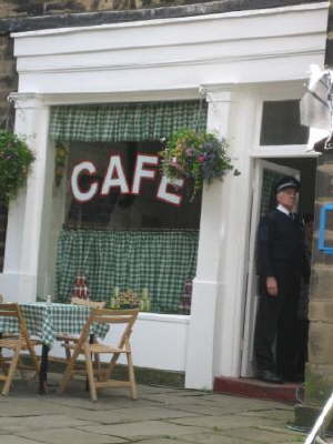 PC Cooper entering cafe
